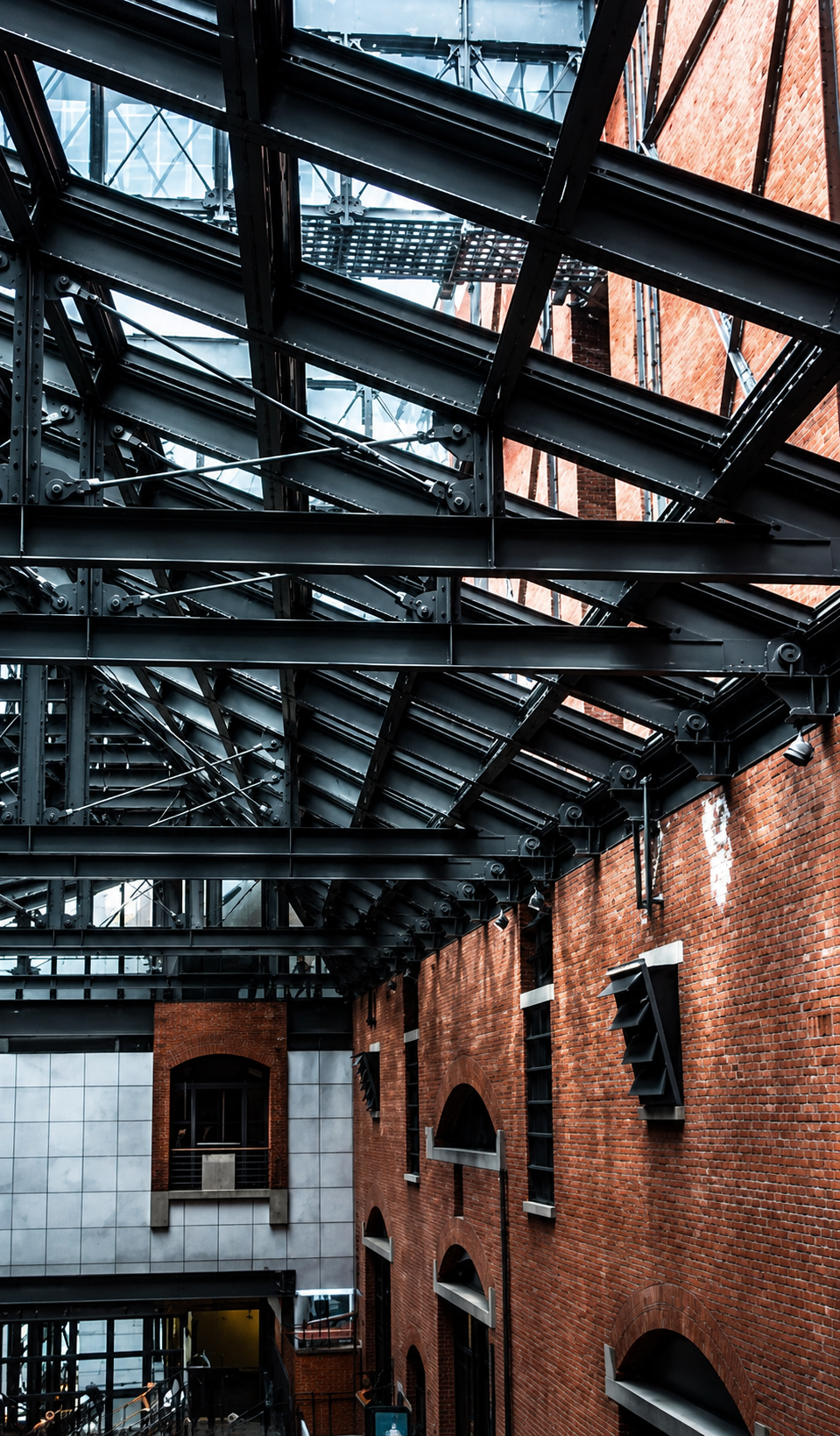 Structural steel and MEP routing on an industrial building roof